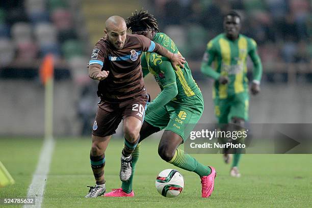 Porto's Portuguese midfielder Andr�� Andr�� in action with CD Tondela's Angolan forward Dolly Menga during the Premier League 2015/16 match between...