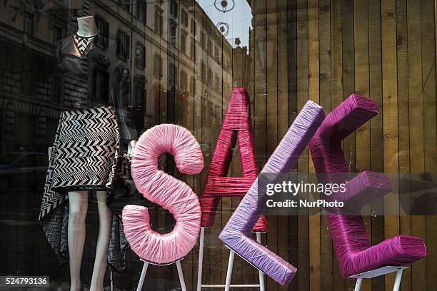 Shop window offering discounts during the winter sales in downtown Rome, Italy, on January 5, 2016. The first day of winter sales in many Italian...