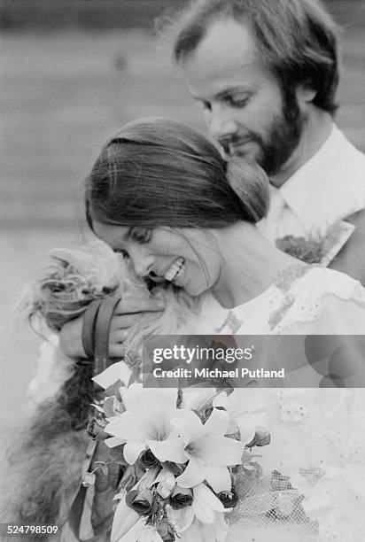 English Radio 1 disc jockey and radio presenter, John Peel with his wife, Sheila Gilhooly, after their wedding, Regents Park, London, 31st August...