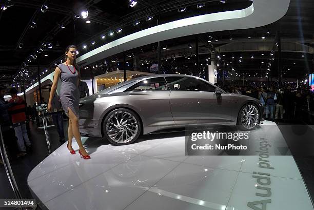 Modal poses with Audi car at the Auto Expo in Greater Noida, on the outskirts of New Delhi in India on Monday, Feb. 8, 2016. The 13th edition of the...