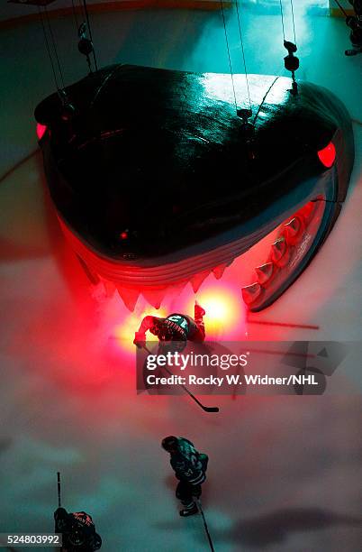 Patrick Marleau of the San Jose Sharks skates out of the shark's head during pregame introductions of the game against the Los Angeles Kings in Game...
