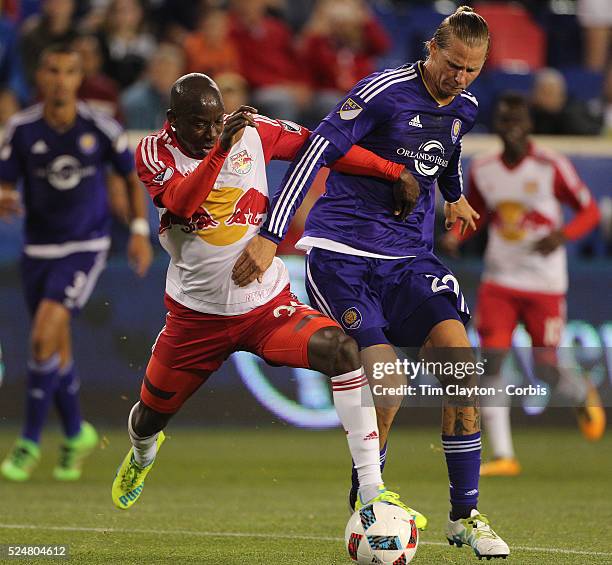 Bradley Wright-Phillips, , #99 of New York Red Bulls is challenged by Brek Shea of Orlando City FC during the New York Red Bulls Vs Orlando City MLS...