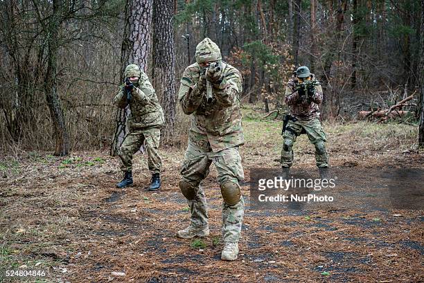 Volunteers and reserve soldiers are learning basics of military stances and moves at training center 'Patriot', Kyiv, Ukraine. 15 of March, 2015. .