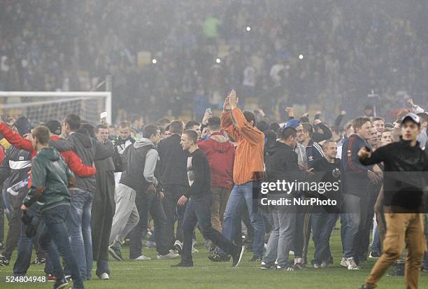 Dnipro fans celebrate after the UEFA Europa League, semi-final, second leg, soccer match between Dnipro and Napoli at the Olimpiyskyi stadium in...