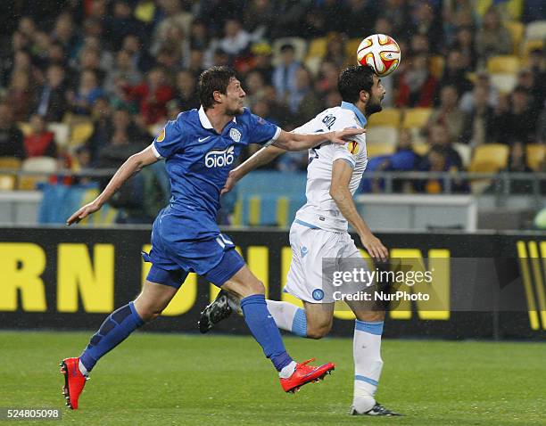 Yevhen Seleznyov of Dnipro vies for the ball with Raul Albiol of Napoli during the UEFA Europa League, semi-final, second leg, soccer match between...