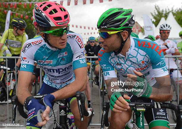 Race leader Przemyslaw Niemiec from Lampre Merida chatting with Luis Mas Bonet from Caja Rural-Seguros team, ahead of the third stage of the 52nd...