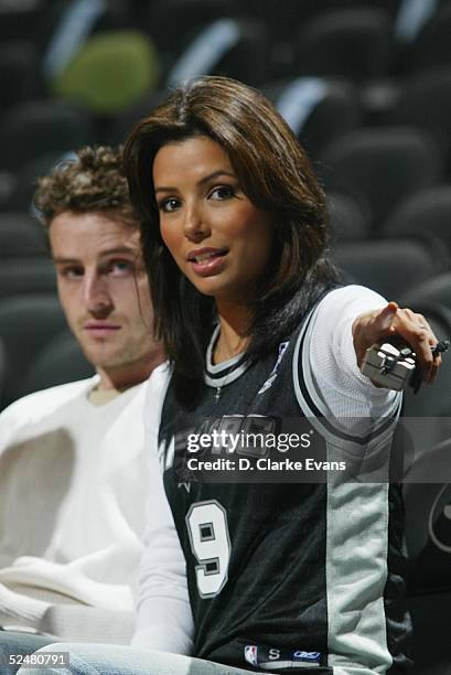 Eva Longoria , star of the TV show "Desperate Housewifes", attends the game with NBA Europe Communications Director, Guillaume Leroy, as the San...