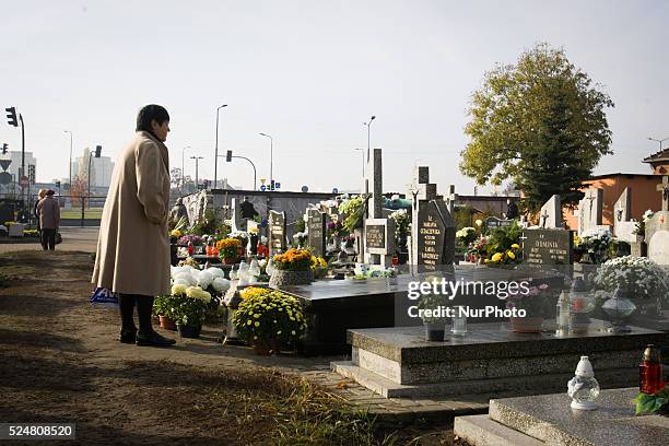 November 2015 - On Sunday people are seen going to the cemetery to commemorate the dead. All Saints Day in Poland is also the day victims of World...