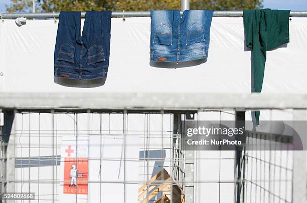 Clothes seen drying on a fence around a sport hall where refugess are being temporarily housed. On Friday night three buses with around 125 refugees...