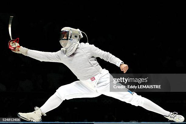 Athens 2004 - Olympic Games. Fencing. Men s team sabre final. The French team is Olympic champion. Julien Pillet . Jeux Olympiques Athenes 2004 -...