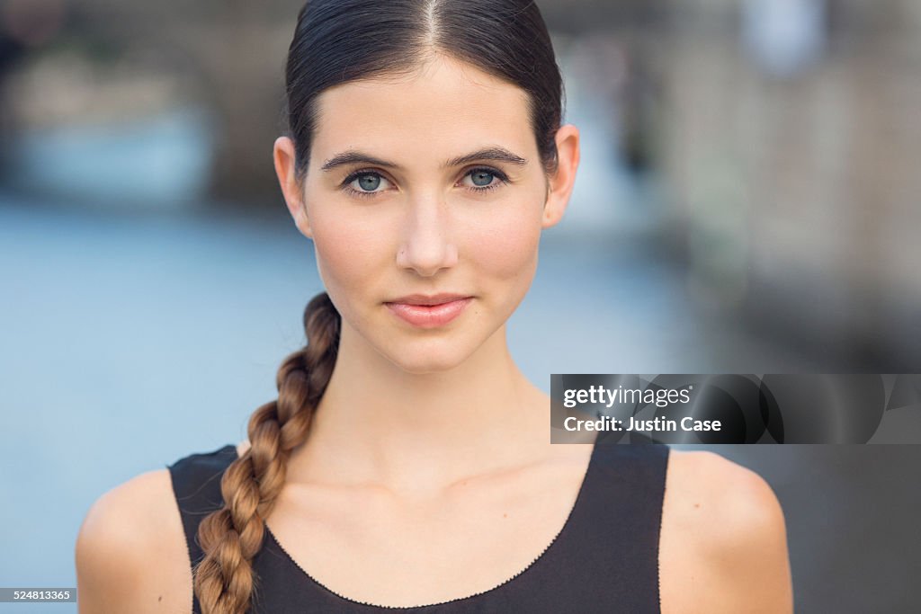 Close portrait of an attractive woman in the city