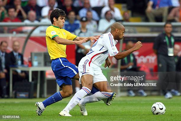 Thierry Henry and Juninho Pernambucano during the FIFA World Cup quater final match between Brazil and France in Frankfurt, Germany.