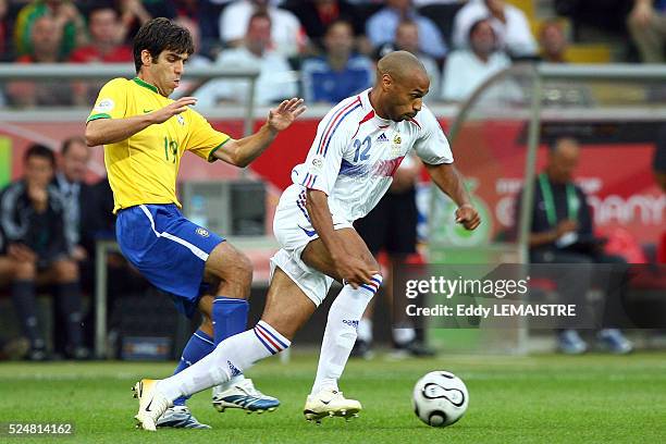 Thierry Henry and Juninho Pernambucano during the FIFA World Cup quarter final match between Brazil and France in Frankfurt, Germany.