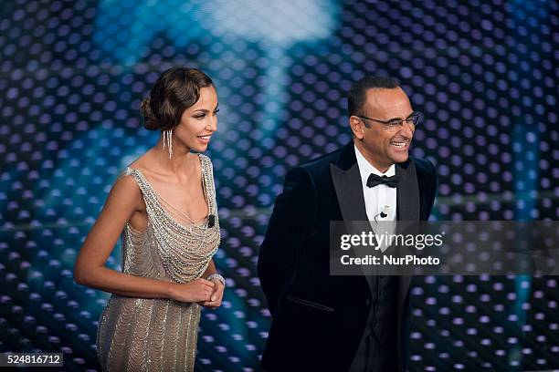 Madalina Ghenea, Carlo Conti attends the 66th Sanremo Music Festival on February 9, 2016.