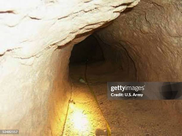 In this handout photo from the U.S. Army released March 26 the inside of a tunnel that was dug leading out of the Camp Bucca detention facitlity near...