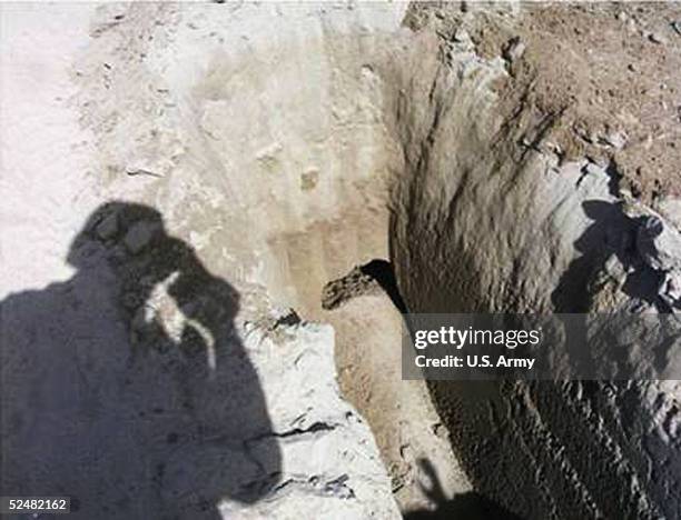 In this handout photo from the U.S. Army released March 26 the entrance of a tunnel that was dug leading out of the Camp Bucca detention facitlity...