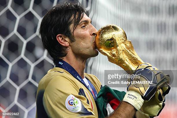 Gianluigi Buffon celebrates with the trophy after the final of the 2006 FIFA World Cup between Italy and France.