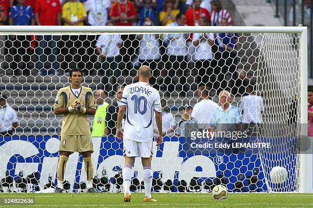 Zinedine Zidane gets ready to take his penalty kick and Gianluigi Buffon tries to disrupt his attention during the final of the 2006 FIFA World Cup...