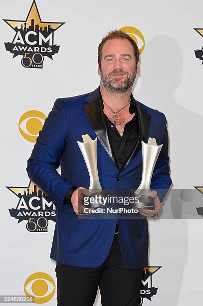 Lee Brice, winner of the Single Record of the Year Award for 'I Don't Dance', poses in the press room at the 50th Academy Of Country Music Awards at...