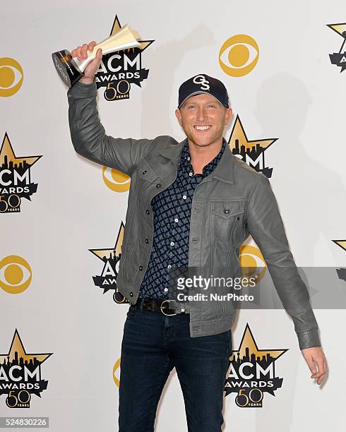Singer Cole Swindell, winner of the New Artist of the Year Award, poses in the press room at the 50th Academy Of Country Music Awards at AT&amp;T...