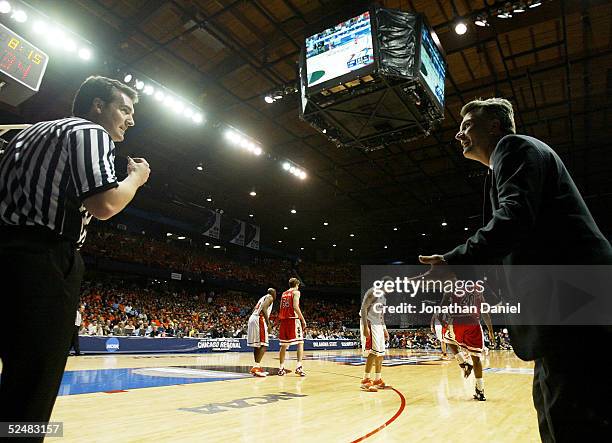 Head coach Bruce Weber of the Illinois Fighting Illini yells toward an official as his team takes on the Arizona Wildcats in the Chicago Regional...