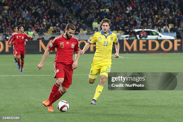 Artem Kravets of Ukraine national team vies with Nacho of Spain during the European Qualifiers 2016 match between Ukraine and Spain national teams,...