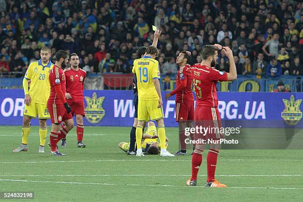 Thiago Alc��ntara reacts as referee shows him a yellow card during the European Qualifiers 2016 match between Ukraine and Spain national teams, at...