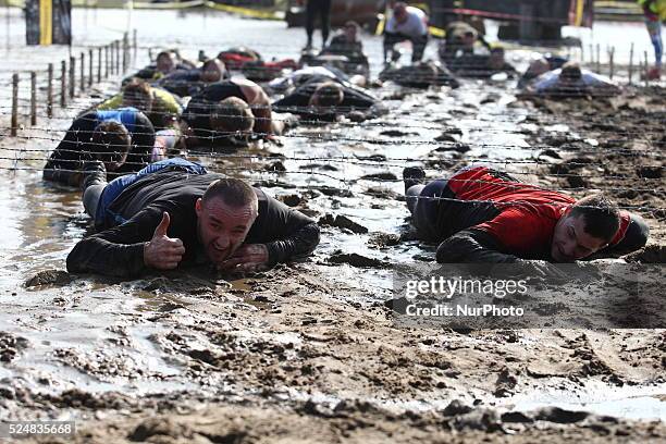 Sopot, Poland 11th, April 2015 The Runmageddon Rekrut extreme run in Sopot at Sopot's hippodrome. Over 1800 participants run, overcoming difficult...