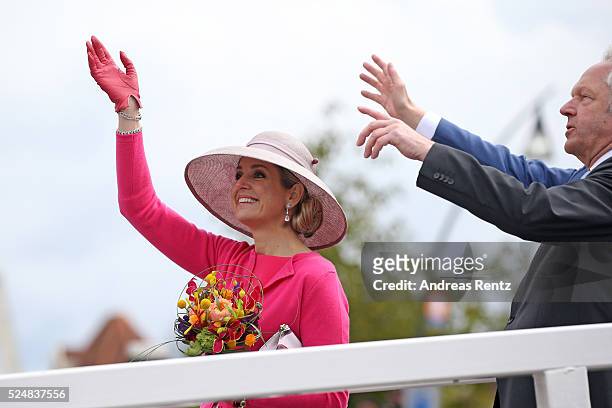 Queen Maxima of The Netherlands and Pieter van Vollenhoven wave to the crowd during King's Day , the celebration of the birthday of the Dutch King,...