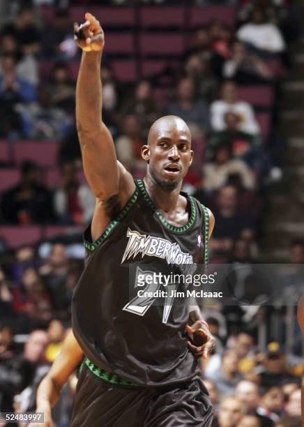 Kevin Garnett of the Minnesota Timberwolves signals to a teammate who scored a basket against the New Jersey Nets during their game on March 26, 2005...