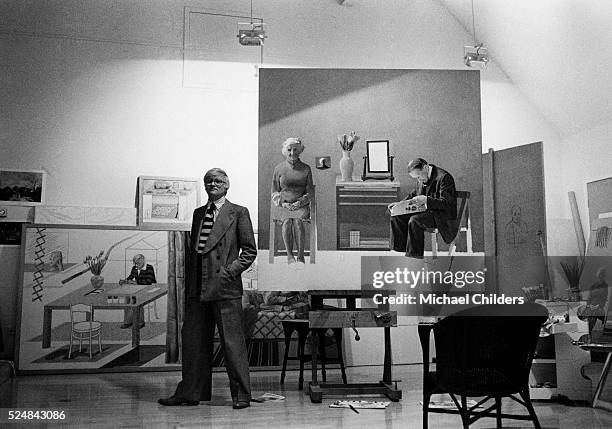 British painter, draughtsman, printmaker, stage designer and photographer David Hockney, in his Los Angeles studio, with parents' picture, circa 1978.