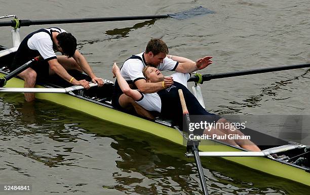 Andrew Triggs Hodge of the winning Oxford team leans back from exhaustion after winning the 151st Oxford v Cambridge Boat Race on the river Thames on...