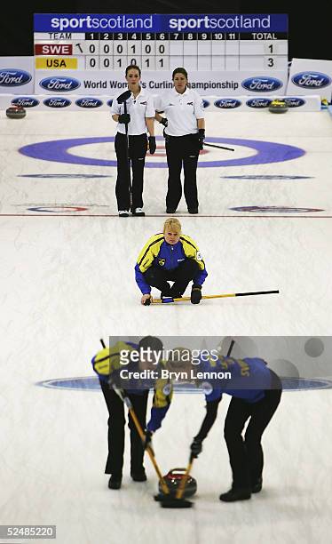 The Swedish curling team of Catherine Lindahl, Ulrika Bergman and Eva Lund in action during the World Women's Curling Championship final between USA...