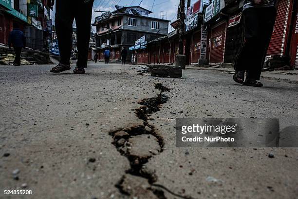 Cracked street after the 7.4 deadly earthquake at Charikot, Dolkha, Nepal, 13 May 2015. This is one of busiest street of Charikot which is related to...