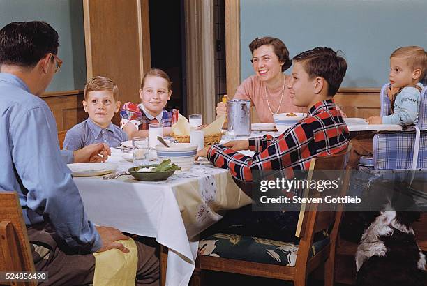 Family Eating at the Dinner Table