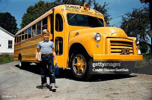 School Bus Dropping off Child at Home