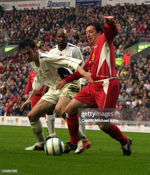 Robbie Fowler and Ralf Little take part in the "Liverpool Legends v Celebrity XI" Tsunami Fundraiser football match at Anfield football ground on...