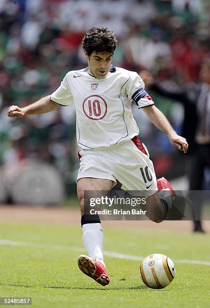 Claudio Reyna of the USA takes the ball down the field against Mexico in the second half during their 2006 FIFA World Cup qualifying match on March...