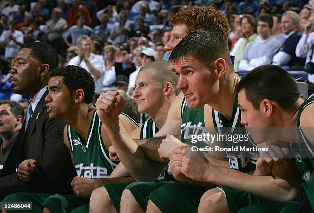Paul Davis and the Michigan State Spartans bench look on during the final minutes of the 2005 NCAA division 1 men's basketball championship...