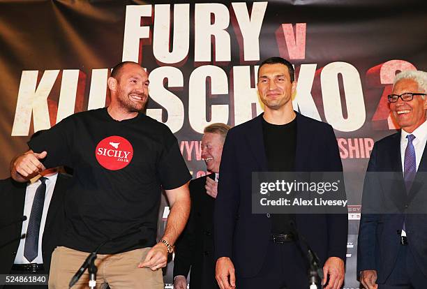 Reigning WBO, WBA and IBO heavyweight champion Tyson Fury dances alongside Wladimir Klitschko during Tyson Fury and Wladimir Klitschko head to head...