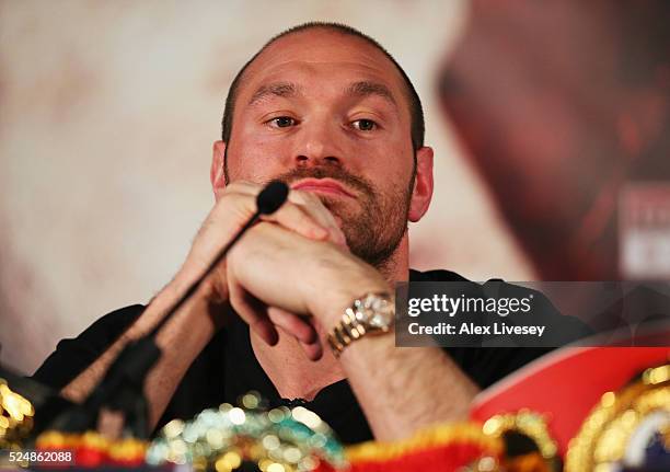 Reigning WBO, WBA and IBO heavyweight champion Tyson Fury looks thoughtful during Tyson Fury and Wladimir Klitschko head to head press conference at...