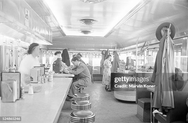 General view of patrons at the counter of Johnny's Diner in Somerville, New Jersey, 1950.