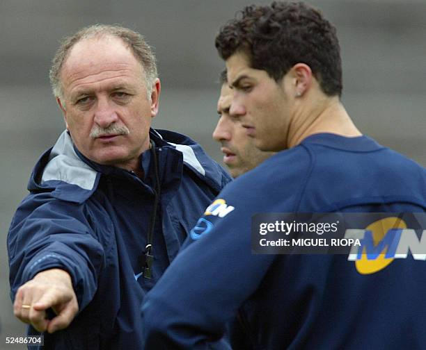 Portugal's coach Brazilian Luiz Felipe Scolari is seen with his players Pauleta and Cristiano Ronaldo during their training at the 1de Maio Stadium,...