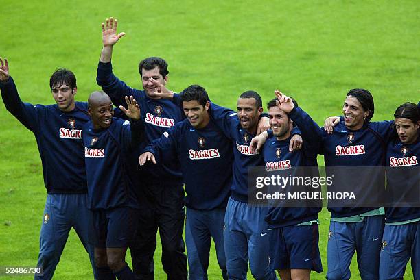 Portugal's players Paulo Ferreira, Luis Boa Morte, Ricardo Costa, Costinha, Hugo Viana, Fernando Meira and Nuno Gomes and physical trainer Darlan...