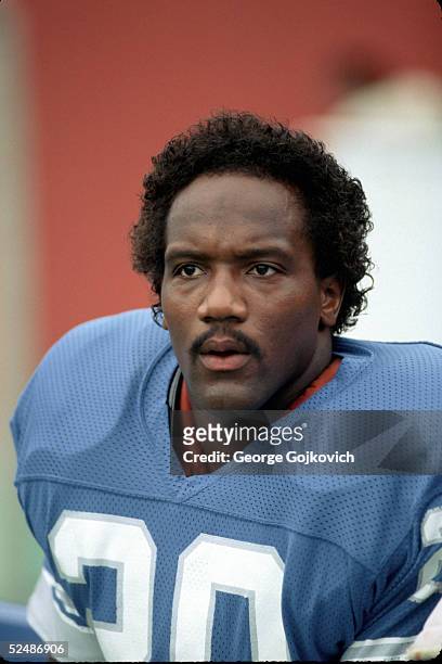 Running back Billy Sims of the Detroit Lions watches the action from the sideline during a preseason game against the Buffalo Bills at Rich Stadim on...