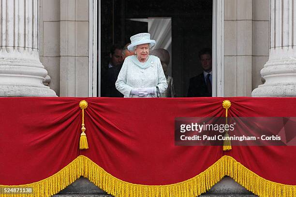 Queen Elizabeth II with future kings - Prince Charles and Prince William on the balcony of Buckingham Palace to commemorate the 60th anniversary of...