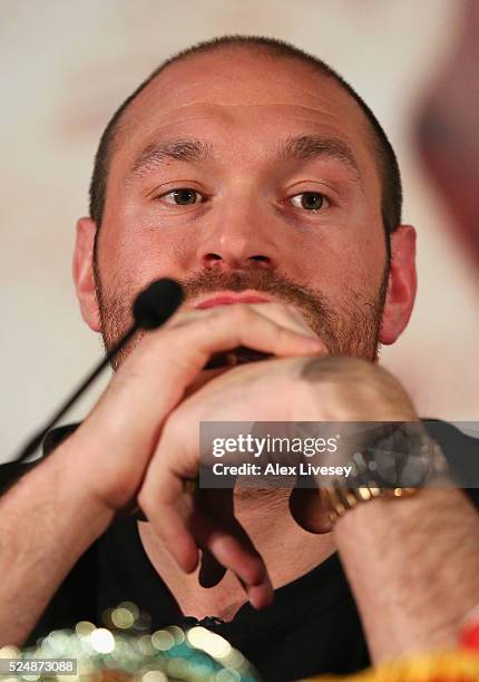 Reigning WBO, WBA and IBO heavyweight champion Tyson Fury looks thoughtful during Tyson Fury and Wladimir Klitschko head to head press conference at...