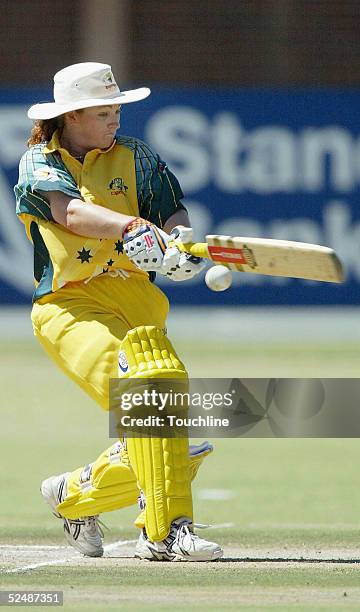 Karen Rolton of Australia hits out during the International Womens Cricket World Cup match between South Africa and Australia at the L.C Oval on...