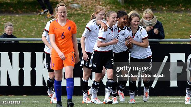 Shekiera Martinez of Germany celebrates with team mates after scoring her team's first goal during the U17 Girl's international friendly match...