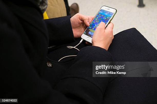 Playing Candy Crush on a mobile phone in London, England, United Kingdom. Candy Crush is one of the most popular apps of all time.